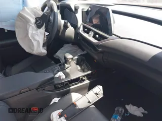 2024 Lexus UX 250h с VIN JTHX6JBH7R2166165, выставлен на аукционе IAAI как лот 42323215 с пробегом 47 518 миль миль и . История ставок и продаж доступна на DreamBid. Изображение 5.