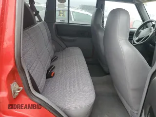 1998 Jeep Cherokee Sport with VIN 1J4FJ68S7WL275947, listed as a Copart auction lot 74333874 with 0 mi miles and Salvage Title. Bid and sale history available at carsss.com. Image 11.