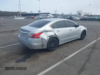 2015 Nissan Altima S with VIN 1N4AL3AP0FC581571, listed as a IAAI auction lot 41618045 with 106,394 mi miles and . Bid and sale history available at DreamBid. Image 6.