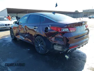 2017 Kia Optima SX Limited with VIN 5XXGV4L23HG157052, listed as a IAAI auction lot 41450492 with 85,949 mi miles and . Bid and sale history available at DreamBid. Image 3.