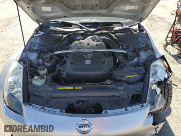 2004 Nissan 350Z Touring z VIN JN1AZ34E94T062960, wystawiony jako Copart lot #55822235 z przebiegiem 186 879 mil mil oraz Szkoda całkowita • Salvage title. Historia ofert i sprzedaży dostępna na DreamBid. Obrazek 11.