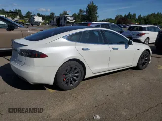 2019 Tesla Model S 100D with VIN 5YJSA1E41KF330631, listed as a Copart auction lot 55360295 with 52,245 mi miles and Salvage title. Bid and sale history available at DreamBid. Image 3.