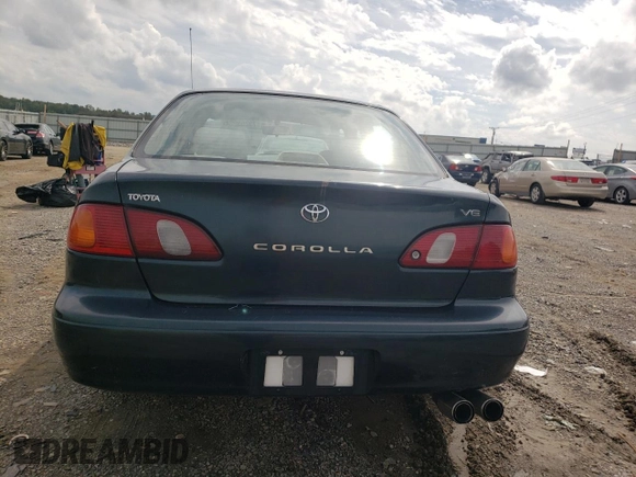 1999 Toyota Corolla VE with VIN 2T1BR12E8XC255511, listed as a Copart auction lot 55388585 with 81,645 mi miles and Salvage title. Bid and sale history available at DreamBid. Image 6.