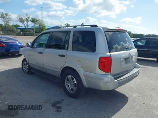 2003 Honda Pilot EX with VIN 2HKYF18603H504829, listed as a IAAI auction lot 42083247 with 247,429 mi miles and . Bid and sale history available at carsss.com. Image 3.