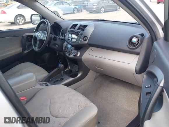 2011 Toyota RAV4 with VIN 2T3BF4DV7BW098298, listed as a IAAI auction lot 42112825 with 215,098 mi miles. Bid and sale history available at carsss.com. Image 5.