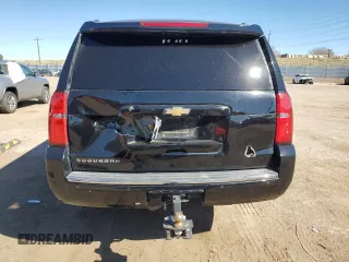 2015 Chevrolet Suburban LTZ with VIN 1GNSKKKC2FR634654, listed as a Copart auction lot 50337415 with 150,255 mi miles and Salvage Title. Bid and sale history available at DreamBid. Image 6.