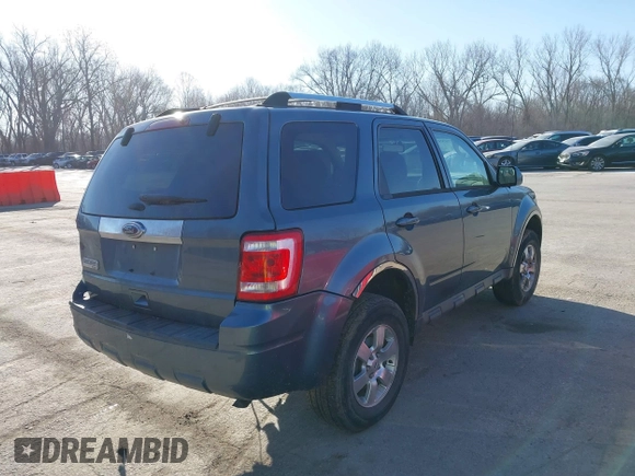 2011 Ford Escape Limited with VIN 1FMCU0E70BKB03218, listed as a IAAI auction lot 41770586 with 159,823 mi miles. Bid and sale history available at carsss.com. Image 4.