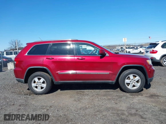 2012 Jeep Grand Cherokee Laredo with VIN 1C4RJFAG7CC297757, listed as a IAAI auction lot 41901645 with 270,731 mi miles. Bid and sale history available at carsss.com. Image 13.