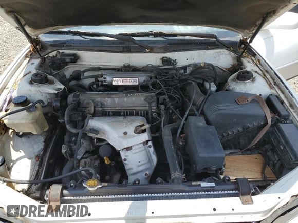 1995 Toyota Camry LE with VIN 4T1SK12E4SU878765, listed as a Copart auction lot 57761385 with 181,674 mi miles and Clean title. Bid and sale history available at DreamBid. Image 11.