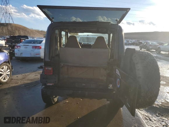 2002 Jeep Wrangler Sahara with VIN 1J4FA59S82P740585, listed as a Copart auction lot 46266265 with 145,129 mi miles and Salvage Title. Bid and sale history available at carsss.com. Image 6.