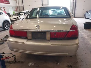 2000 Mercury Grand Marquis LS z VIN 2MEFM75W0YX736324, wystawiony jako IAAI lot #41865927 z przebiegiem 136 886 mil mil oraz . Historia ofert i sprzedaży dostępna na DreamBid. Obrazek 16.
