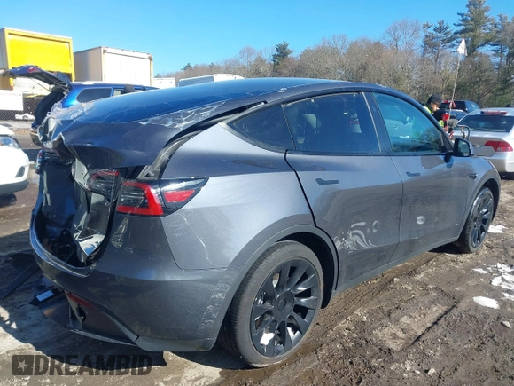 2023 Tesla Model Y Long Range with VIN 7SAYGAEE9PF905943, listed as a IAAI auction lot 41444255 with 11,179 mi miles and . Bid and sale history available at DreamBid. Image 4.