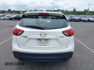 2016 Mazda CX-5 Sport with VIN JM3KE4BY7G0764563, listed as a IAAI auction lot 42279993 with 128,950 mi miles and . Bid and sale history available at DreamBid. Image 16.