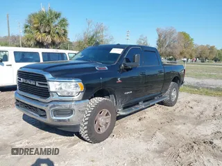 2020 Ram 2500 Big Horn with VIN 3C6UR5DL3LG159756, listed as a IAAI auction lot 41672866 with 89,417 mi miles and . Bid and sale history available at DreamBid. Image 2.
