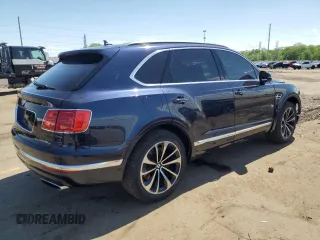 2017 Bentley Bentayga W12 z VIN SJAAC2ZV2HC014547, wystawiony jako Copart lot #57488755 z przebiegiem 63 359 mil mil oraz Tytuł czysty. Historia ofert i sprzedaży dostępna na DreamBid. Obrazek 3.