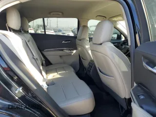2019 Cadillac XT4 FWD Luxury z VIN 1GYAZAR42KF116087, wystawiony jako Copart lot #50231165 z przebiegiem 69 091 mil mil oraz Szkoda całkowita • Salvage title. Historia ofert i sprzedaży dostępna na DreamBid. Obrazek 11.