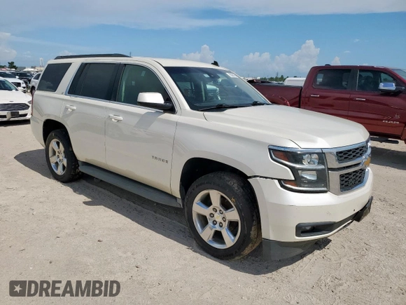2015 Chevrolet Tahoe LT with VIN 1GNSCBKC5FR302611, listed as a Copart auction lot 62068165 with 184,136 mi miles and Salvage title. Bid and sale history available at DreamBid. Image 4.