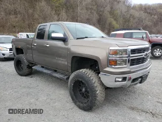 2014 Chevrolet Silverado 1500 LTZ with VIN 1GCVKSEC0EZ140325, listed as a Copart auction lot 52954845 with 128,231 mi miles and Salvage Title. Bid and sale history available at DreamBid. Image 4.