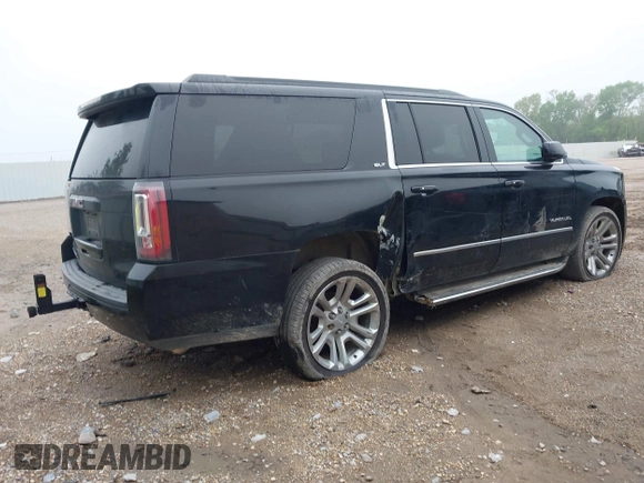 2017 GMC Yukon XL SLT with VIN 1GKS1GKC7HR340179, listed as a IAAI auction lot 41887780 with 195,978 mi miles. Bid and sale history available at carsss.com. Image 4.