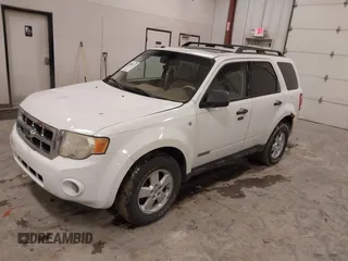 2008 Ford Escape XLT with VIN 1FMCU93128KA82058, listed as a IAAI auction lot 42005473 with 199,016 mi miles. Bid and sale history available at carsss.com. Image 2.
