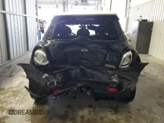 2017 MINI Hardtop 4 Door Cooper S z VIN WMWXU3C33H2F49198, wystawiony jako Copart lot #45210935 z przebiegiem 139 332 mil mil oraz Szkody całkowita. Historia ofert i sprzedaży dostępna na DreamBid. Obrazek 6.