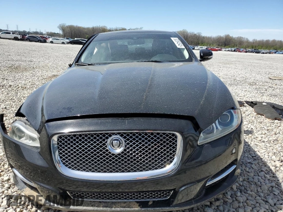 2012 Jaguar XJ with VIN SAJWA1CB2CLV38648, listed as a Copart auction lot 50264545 with Not Provided miles and Salvage Title. Bid and sale history available at DreamBid. Image 5.