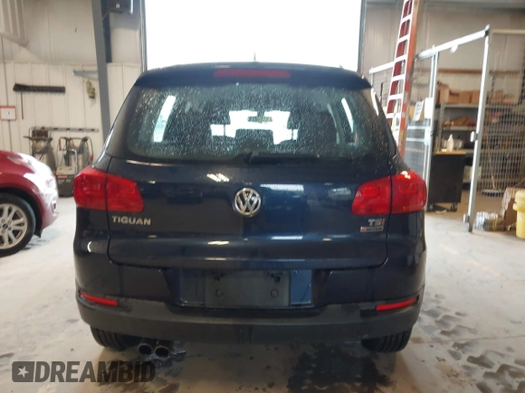 2016 Volkswagen Tiguan S with VIN WVGBV7AXXGW565289, listed as a IAAI auction lot 42113317 with 83,537 mi miles and . Bid and sale history available at DreamBid. Image 16.