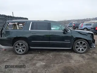 2016 GMC Yukon XL Denali with VIN 1GKS2HKJ8GR406450, listed as a IAAI auction lot 41661050 with 125,830 mi miles. Bid and sale history available at carsss.com. Image 14.