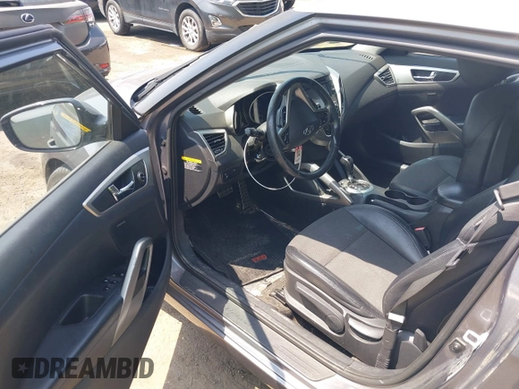 2013 Hyundai Veloster w/Gray Int with VIN KMHTC6AD5DU132237, listed as a IAAI auction lot 42268005 with 84,646 mi miles and . Bid and sale history available at DreamBid. Image 5.