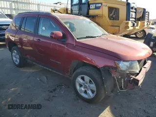 2016 Jeep Compass Latitude with VIN 1C4NJCEB2GD749061, listed as a Copart auction lot 83071564 with 127,616 mi miles and Salvage Title. Bid and sale history available at carsss.com. Image 4.