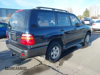 2000 Toyota Land Cruiser with VIN JT3HT05J3Y0098534, listed as a IAAI auction lot 41054858 with 336,520 mi miles. Bid and sale history available at carsss.com. Image 4.