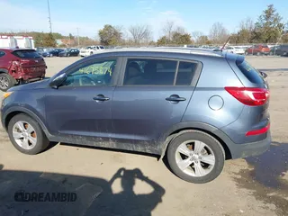 2012 Kia Sportage LX with VIN KNDPB3A22C7306154, listed as a IAAI auction lot 41675874 with 130,837 mi miles. Bid and sale history available at carsss.com. Image 14.