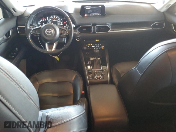 2019 Mazda CX-5 Grand Touring with VIN JM3KFADM3K1539890, listed as a Copart auction lot 57809835 with 56,079 mi miles and Salvage title. Bid and sale history available at DreamBid. Image 8.