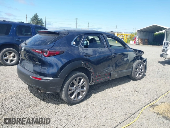 2021 Mazda CX-30 Select with VIN 3MVDMBBL6MM243726, listed as a IAAI auction lot 42353943 with 67,239 mi miles and . Bid and sale history available at DreamBid. Image 4.
