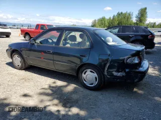 1999 Toyota Corolla VE with VIN 1NXBR12E7XZ240321, listed as a Copart auction lot 64259115 with 144,145 mi miles and Salvage title. Bid and sale history available at DreamBid. Image 2.
