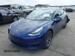 2019 Tesla Model 3 Mid Range with VIN 5YJ3E1EA5KF190453, listed as a IAAI auction lot 41880684 with 58,909 mi miles and . Bid and sale history available at carsss.com. Image 21.