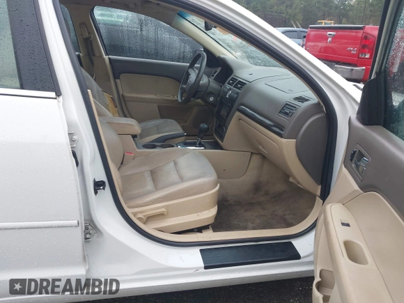 2009 Ford Fusion SEL with VIN 3FAHP08199R103707, listed as a IAAI auction lot 40882108 with 239,154 mi miles and . Bid and sale history available at carsss.com. Image 5.