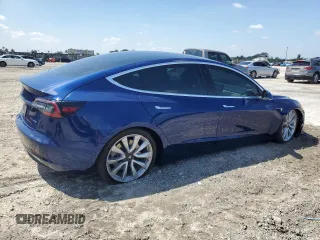 2020 Tesla Model 3 Long Range with VIN 5YJ3E1EB4LF744575, listed as a Copart auction lot 50202375 with 61,357 mi miles and Salvage Title. Bid and sale history available at carsss.com. Image 3.