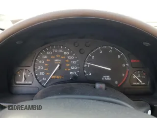 1999 Saturn SC with VIN 1G8ZR1275XZ375833, listed as a Copart auction lot 87960885 with 97,697 mi miles and Salvage Title. Bid and sale history available at carsss.com. Image 9.