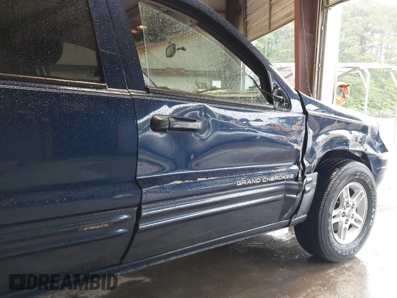 2000 Jeep Grand Cherokee Limited with VIN 1J4GW58N1YC264567, listed as a IAAI auction lot 42215459 with 170,874 mi miles and . Bid and sale history available at DreamBid. Image 13.
