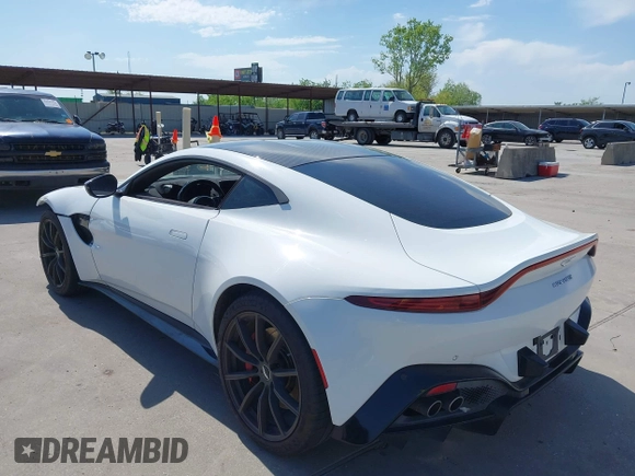 2019 Aston Martin Vantage z VIN SCFSMGAW4KGN01848, wystawiony jako IAAI lot #42032076 z przebiegiem 54 469 mil mil oraz . Historia ofert i sprzedaży dostępna na DreamBid. Obrazek 3.