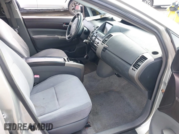 2005 Toyota Prius with VIN JTDKB20U257017611, listed as a IAAI auction lot 42087781 with 263,985 mi miles. Bid and sale history available at carsss.com. Image 5.
