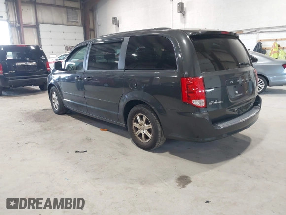 2012 Dodge Grand Caravan SXT with VIN 2C4RDGCG4CR224850, listed as a IAAI auction lot 42070300 with 177,982 mi miles and . Bid and sale history available at DreamBid. Image 3.