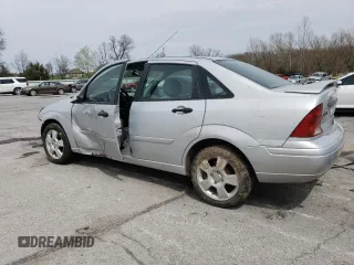 2004 Ford Focus SE with VIN 1FAFP34344W113759, listed as a Copart auction lot 51386335 with 148,267 mi miles and Salvage title. Bid and sale history available at DreamBid. Image 2.
