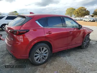 2023 Mazda CX-5 Signature with VIN JM3KFBXY4P0100652, listed as a Copart auction lot 82235664 with 29,344 mi miles and Salvage Title. Bid and sale history available at carsss.com. Image 3.