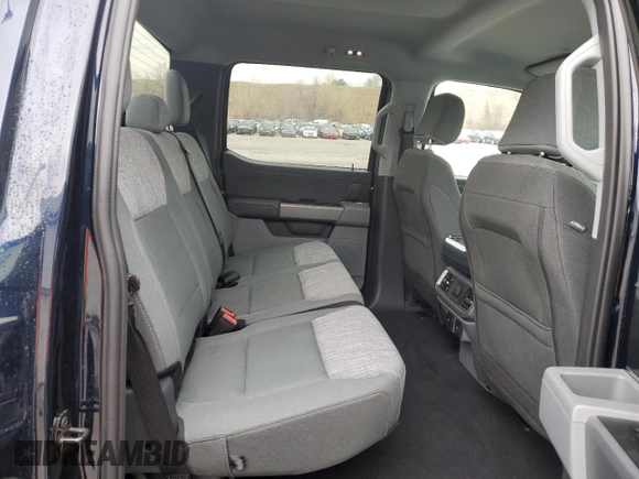 2023 Ford F-150 Lightning Pro with VIN 1FT6W1EV8PWG38071, listed as a Copart auction lot 51091495 with 13,687 mi miles and Salvage title. Bid and sale history available at DreamBid. Image 10.