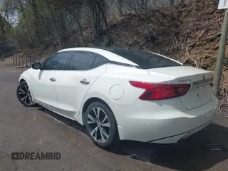 2017 Nissan Maxima SV z VIN 1N4AA6AP3HC434557, wystawiony jako IAAI lot #42203547 z przebiegiem 121 518 mil mil oraz . Historia ofert i sprzedaży dostępna na DreamBid. Obrazek 3.