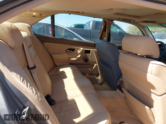 2001 BMW 7 Series 740iL with VIN WBAGH83421DP25417, listed as a IAAI auction lot 41725971 with 165,599 mi miles. Bid and sale history available at carsss.com. Image 8.