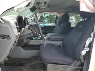 2023 Ford F-150 XL with VIN 1FTFW1E85PKG17275, listed as a Copart auction lot 57497155 with 34,379 mi miles and Salvage title. Bid and sale history available at DreamBid. Image 7.