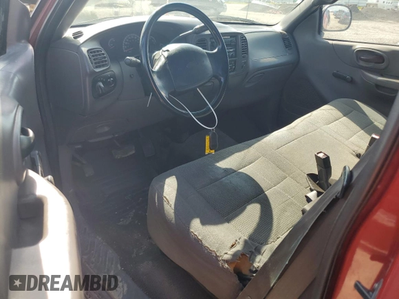 2001 Ford F-150 XL with VIN 1FTZX07261KA62955, listed as a Copart auction lot 56580915 with 159,451 mi miles and Salvage title. Bid and sale history available at DreamBid. Image 8.